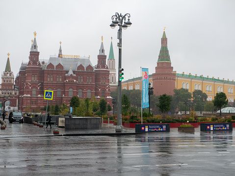 Moscow, Russia - September 21, 2021: Beautiful view of the building of the Moscow Kremlin and the Historical Museum on a rainy autumn day.