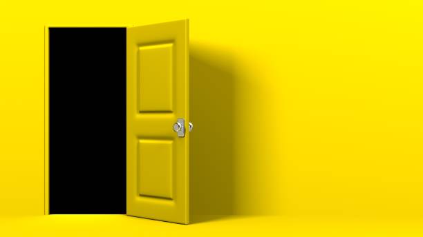 istock Yellow door and dark room. 1366550685