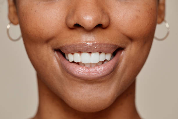 istock Young Black Woman Smiling Close Up 1366553681