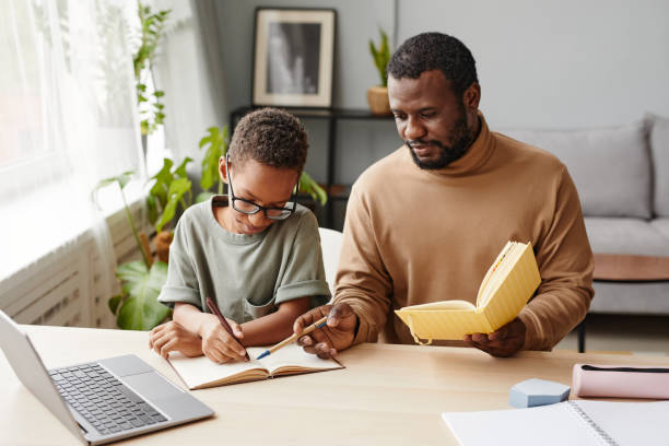 istock African American Father Helping Son Studying 1366555016