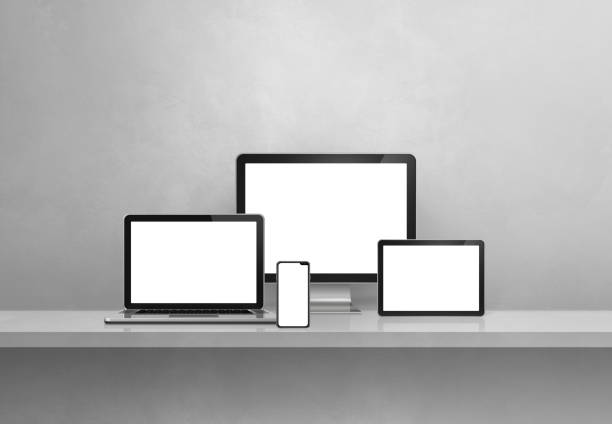 istock Computer, laptop, mobile phone and digital tablet pc. Grey shelf banner 1366555637