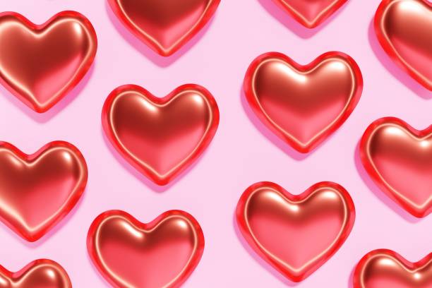 istock 3d render of red hearts pattern on a pastel pink background 1366555898