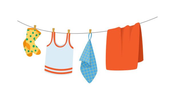 trocknen von kinderkleidung und zubehör nach dem waschen am seil. - laundry clothing clothesline hanging stock-grafiken, -clipart, -cartoons und -symbole