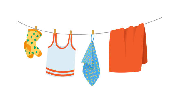 Drying children's clothes and accessories after washing on a rope. Kids clothes on clothesline. Drying children's clothes and accessories after washing on a rope. Baby clothes and bath towels. Socks, T-shirt, towels vector cartoon. cartoon of the clothes line stock illustrations