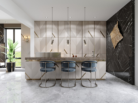 A chic modern kitchen with a designer beige front with gold accents and a trendy kitchen island with three chairs. 3d rendering.