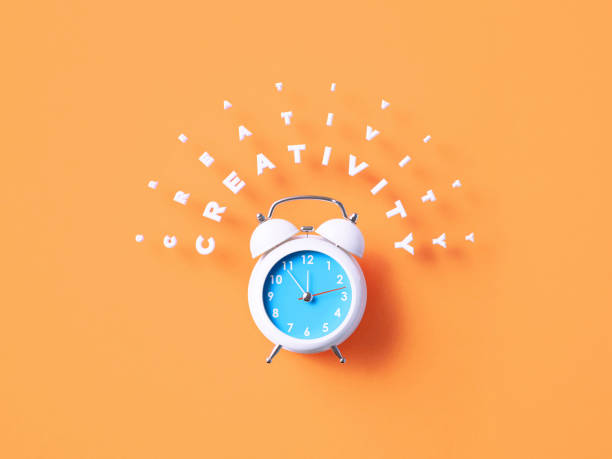 istock Creativity Message Sitting Above White Alarm Clock On Orange Background 1366558710