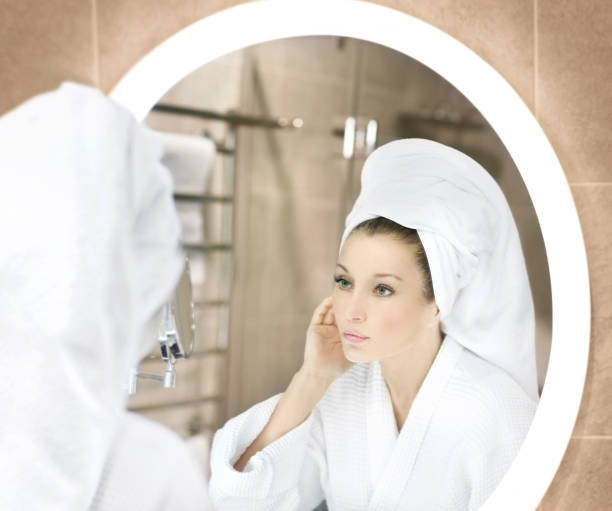 istock Magic anti-aging cream.Applying the cream. 1366565973