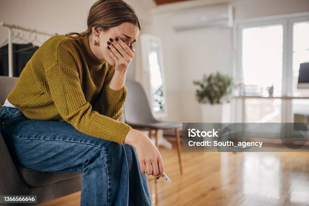 Disappointed Woman Crying Because Pregnancy Test Is Negative Again Stock Photo - Download Image Now
