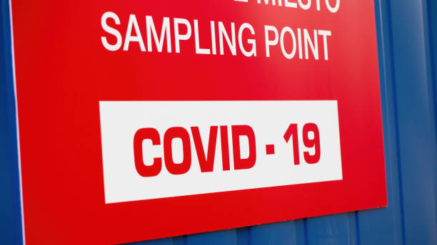 istock Detail of red label saying COVID-19 sampling point 1366567212