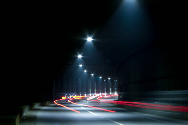 istock Dark tunnel with light trails. Motion blur image of a dark tunnel. 1366570619