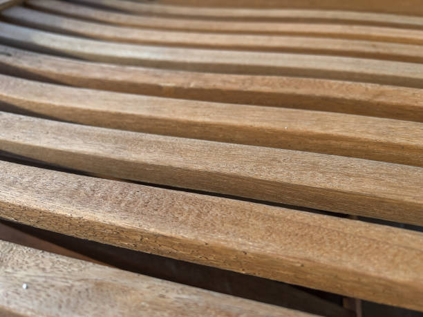 istock Light wooden beams with spacing. 1366570622