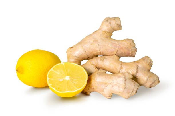 istock Fresh raw ginger root and lemon isolated on white background. Medical ingredients for antiflu drink, support and boosting immunity. 1366574710