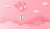 istock illustration of love with heart balloon gift box and clouds 1366576523