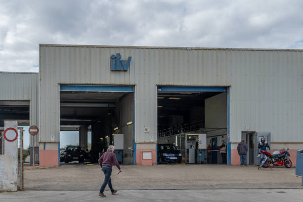 Technical vehicle inspection station, ITV Manacor, Spain; january 20 2022: Technical vehicle inspection station, ITV, in the Majorcan town of Manacor, on a cloudy day. Spain itv photos stock pictures, royalty-free photos & images