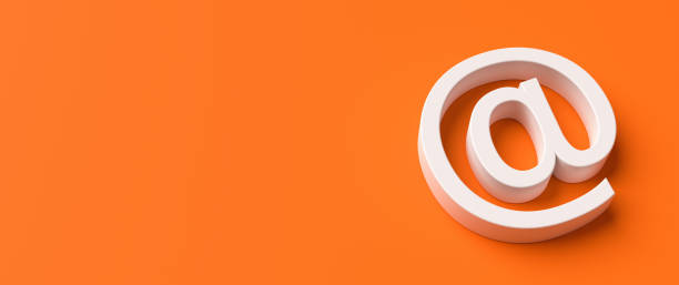 Email white sign on orange background copy space stock photo