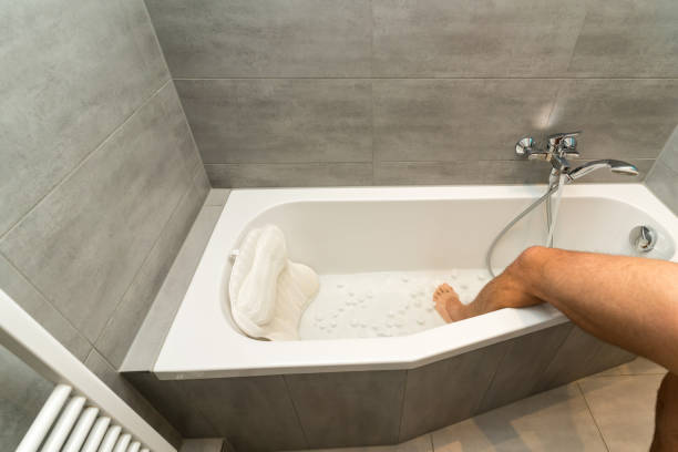 istock A man goes into a bathtub filled with cold water and ice cubes 1366581179