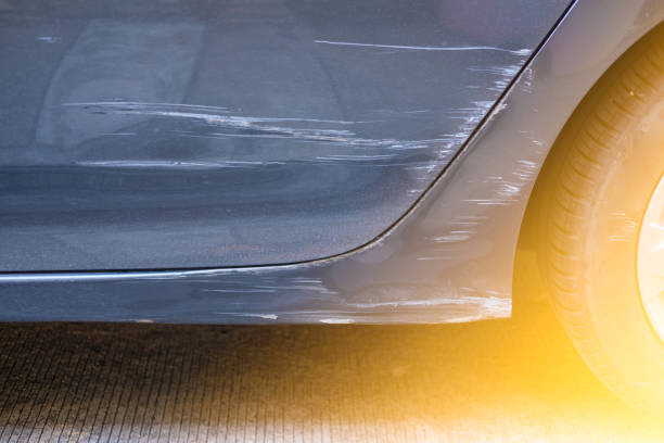 istock A car gray with a scratch on bumper and door 1366585111