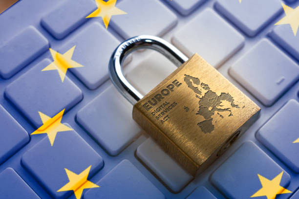 istock Digital service act (Europe) concept: lock on computer keyboard and europe flag 1366585310