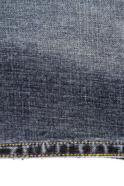 istock Piece of dark jeans fabric 1366586940