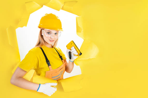 istock Woman engineer in uniform is holding repair instrument 1366587749
