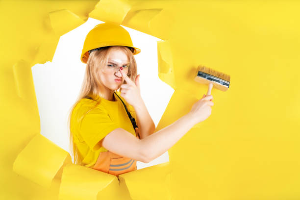 istock Female builder involved in renovation 1366588218