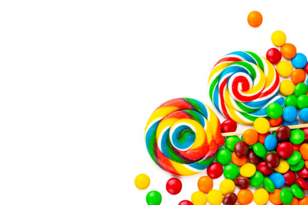 istock Colorful lollipops and different colored round candy. Top view. 1366589190
