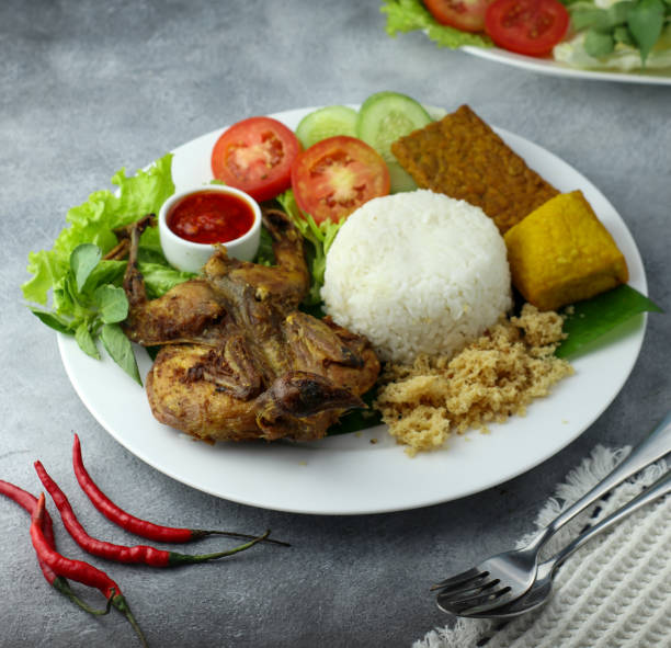 istock Fried chicken with crispy spiced flakes 1366589775