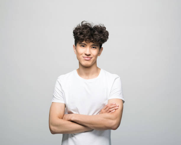 istock Cheerful young man in white t-shirt 1366594792