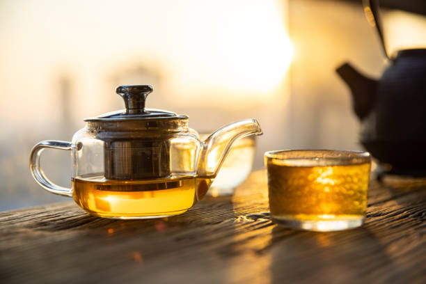 istock Hot tea in glass tea cup on table 1366594835