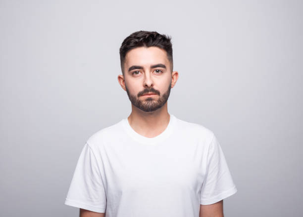 istock Confident young man in white t-shirt 1366595248