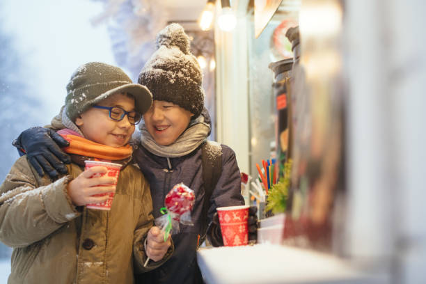 istock Children at Christmas market 1366595419