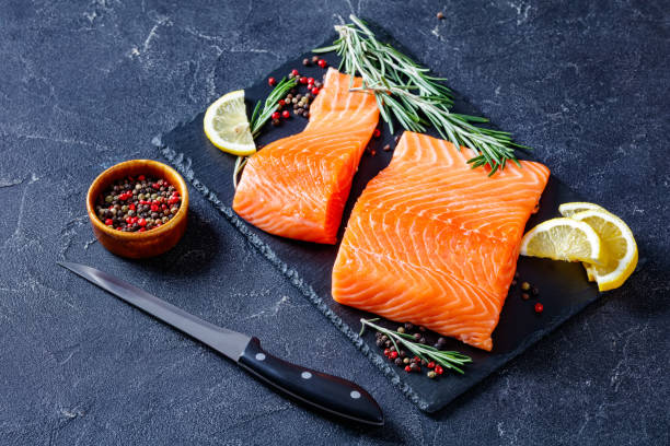 istock Fresh salmon fish fillet on slate plate 1366595452