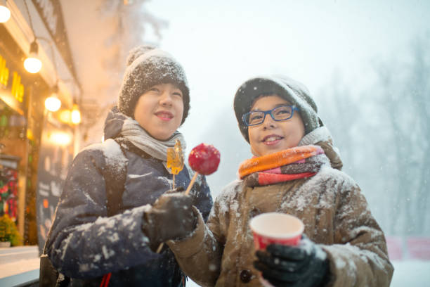 istock Children at Christmas market 1366596149