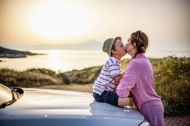 istock Enjoying road trip with mum 1366596195