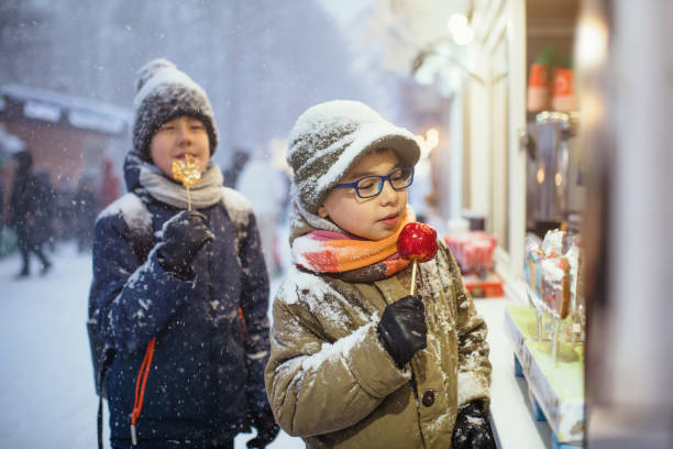 istock Children at Christmas market 1366596196