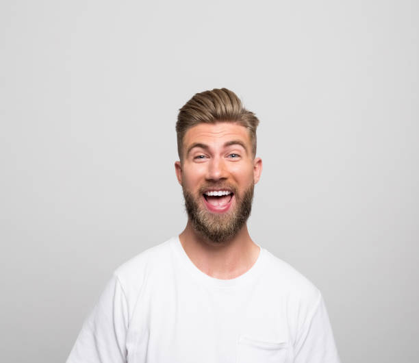 Headshot of excited young man