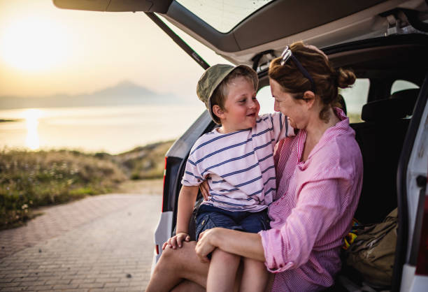 istock Mother and boy on the road trip 1366598077
