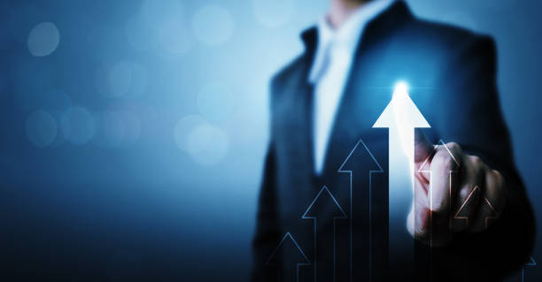 istock Business development to success and growing growth concept. Businessman pointing arrow graph corporate future growth plan 1366598280