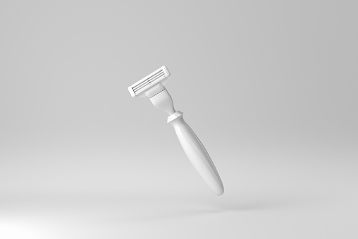 man's razor on white background. minimal concept. 3D render.