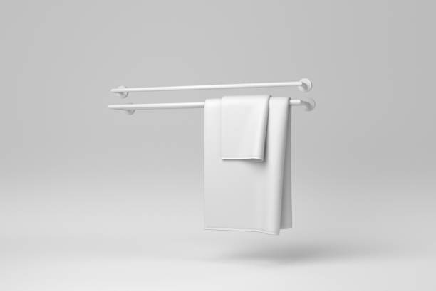 istock White cotton terry towels hanging on a white background. minimal concept. monochrome. 3D render. 1366599553