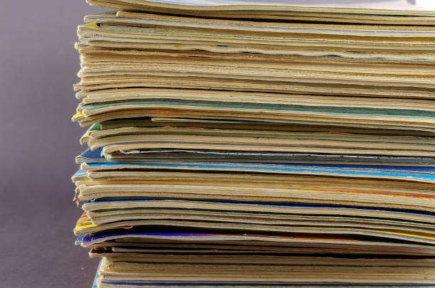 istock Collection of old comics and magazines against a gray background 1366599785