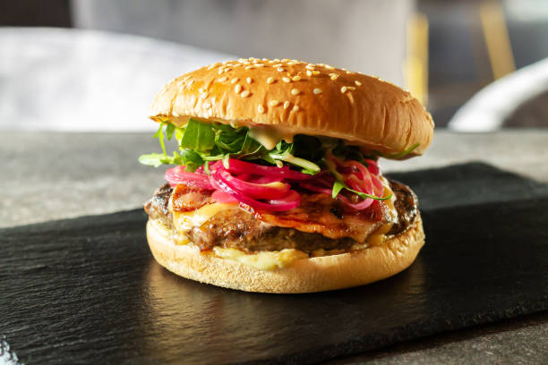 istock Beef burger on fast food restaurant table 1366600169