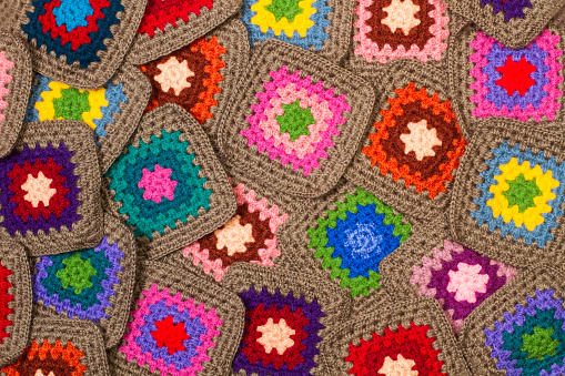 Colored wool crochet doilies in a top view