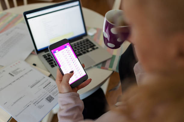 istock Mature Woman Using Investment Mobile App 1366601710