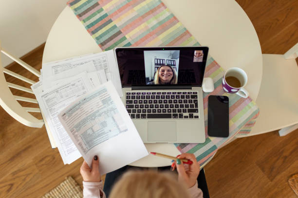 istock Woman Communicating With Her Financial Advisor Over Video Call 1366601786
