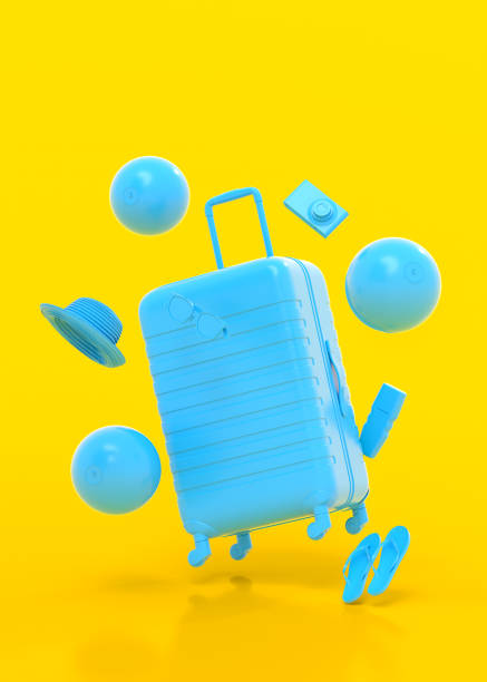 istock Colorful suitcase or baggage with beach accessories on yellow background. 1366601862