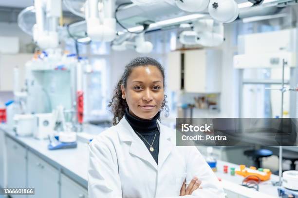 Portrait Of Confident Woman Scientist In Laboratory Stock Photo - Download Image Now