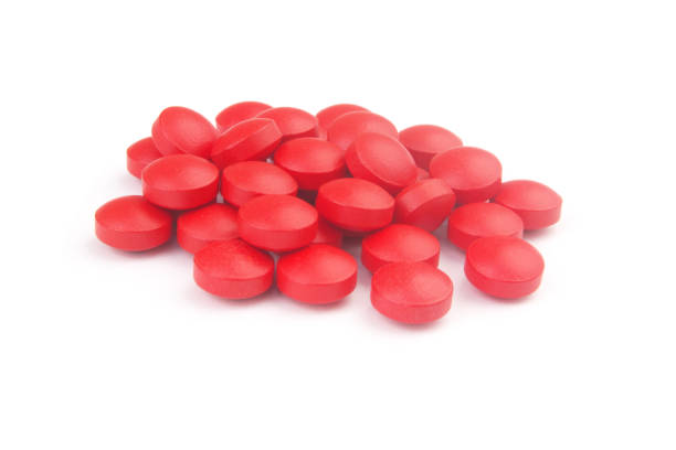 istock Red drugs isolated on white background. 1366603572