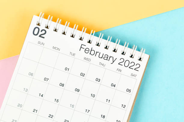 istock February 2022 desk calendar on multicolored background. 1366603652