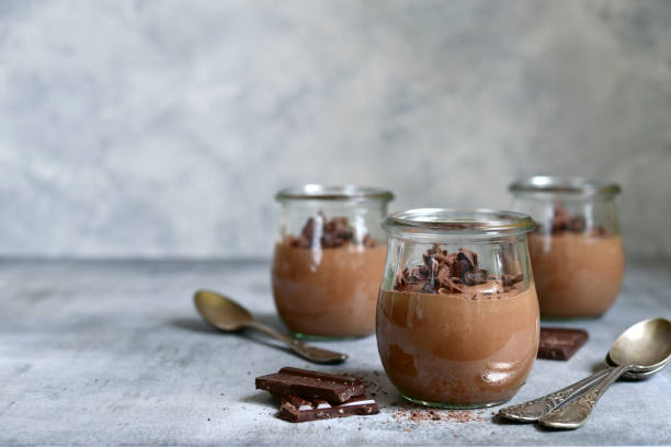 istock Delicious chocolate mousse in a vintage glasse jar. 1366604982